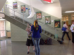 Student breaking open piñata on Friday.
