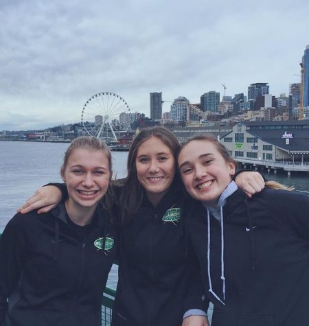 Watt (left), with basketball teammates, Ashley Moriarty (center), and Sadie Kenny (right).