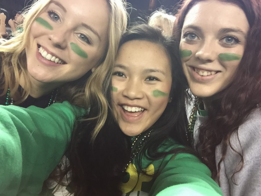 Phuong Nguyen (middle) posing at a Blanchet football game this year with two of her good friends that she made at Blanchet. Miriam Mende (left) and Brianna Bjolstad (right)