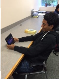 Senior Marcus Lewis works on his Western Washington application.