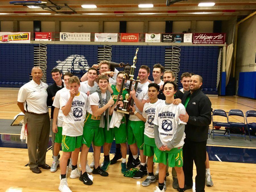 The team celebrates their Bellevue College Holiday Tournament title