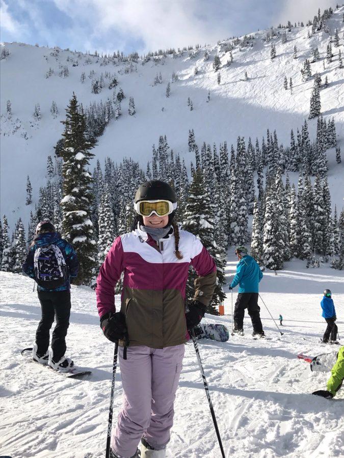 Reporter Julia Weinand plows through the powder on Crystal Mountain.