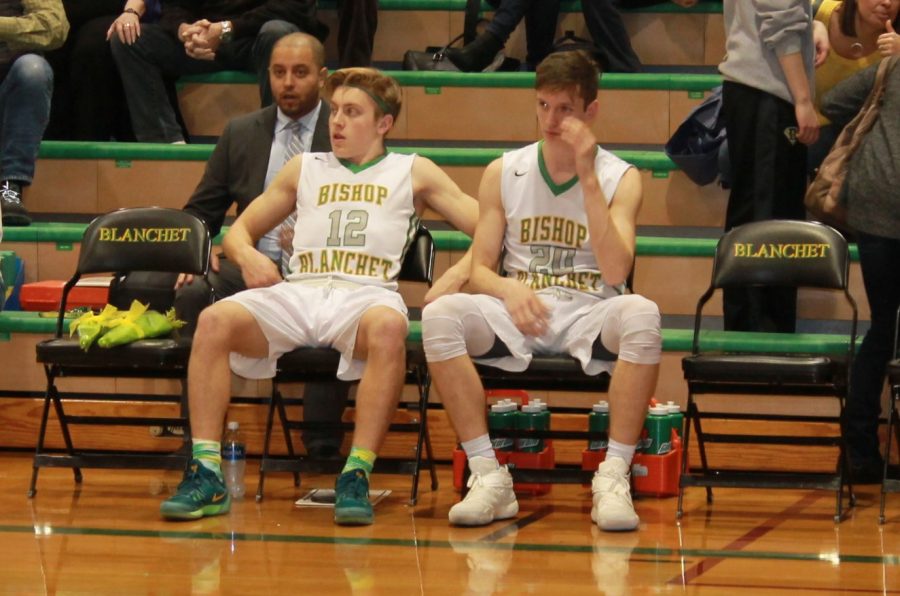 Seniors Will Merriman and Liam Eberhardt prepare to take the court for the final time.