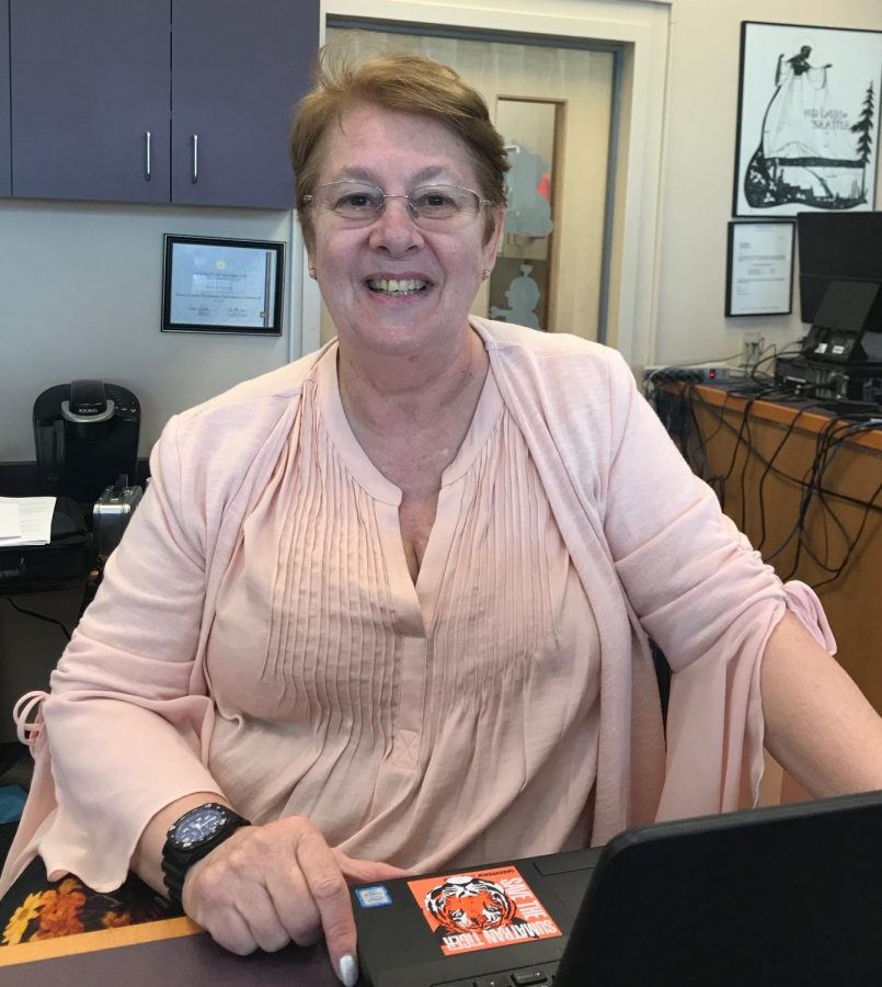 More Than a Teacher: Señora Rodriguez working after school in the library. Señora has taught generations of students both in and out of the classroom. Always making herself available, Señora puts her pupils learning before all else, even if it means staying multiple hours after school for extra instruction.