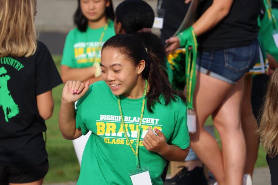 A freshman participates in the icebreakers. 