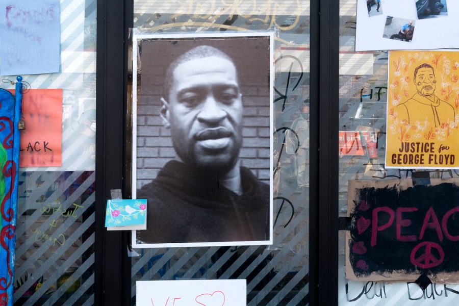 A photograph of George Floyd at the George Floyd Memorial outside Cup Foods in Minneapolis, Minnesota