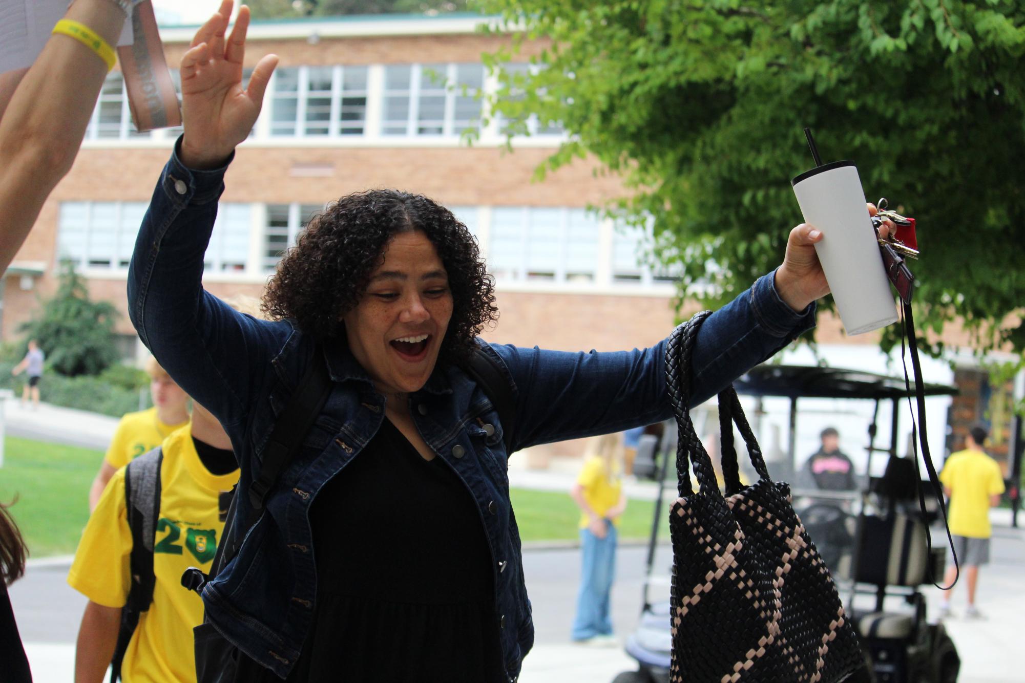 MAKING AN ENTRANCE: Vice Principal Nicole McCoy expresses her enthusiasm  during Frosh Welcome. At Blanchet, spirit and cheers doesn't only show up at sports games.