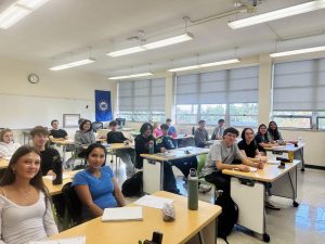 ON TIME: Students in Mr. McCarthy's statistics class take a brief break from their work. As changes to the morning bell schedule leave some scrambling, classes keep rolling.