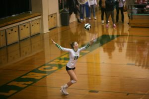 SEALING THE SET: Blanchet Sophomore Clara Kane delivers a strong serve during the third set.